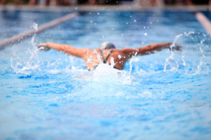 person swimming in pool