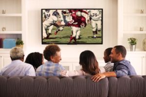 People watching football game on tv