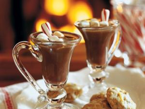 mugs of hot chocolate with marshmallows and peppermint