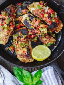 Plate of cooked seafood with lemon