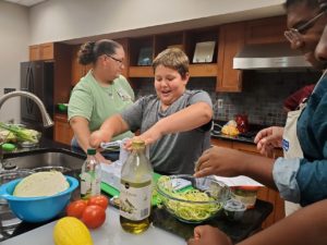 4H camper making zucchini noodles