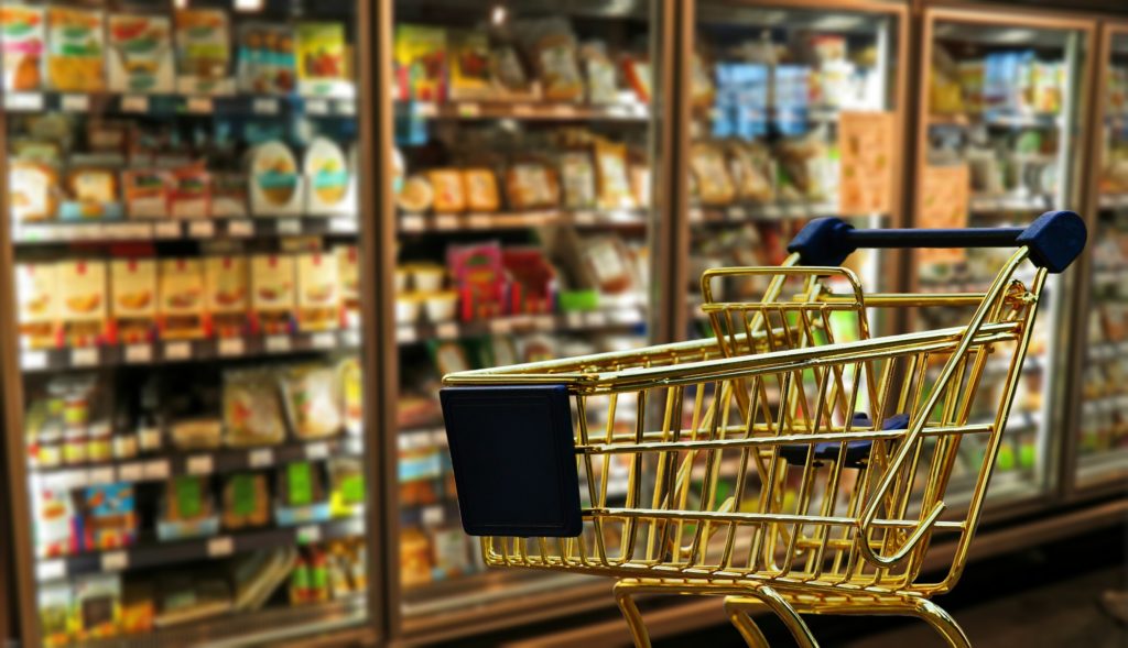 Buggy in the refrigerated section at a supermarket