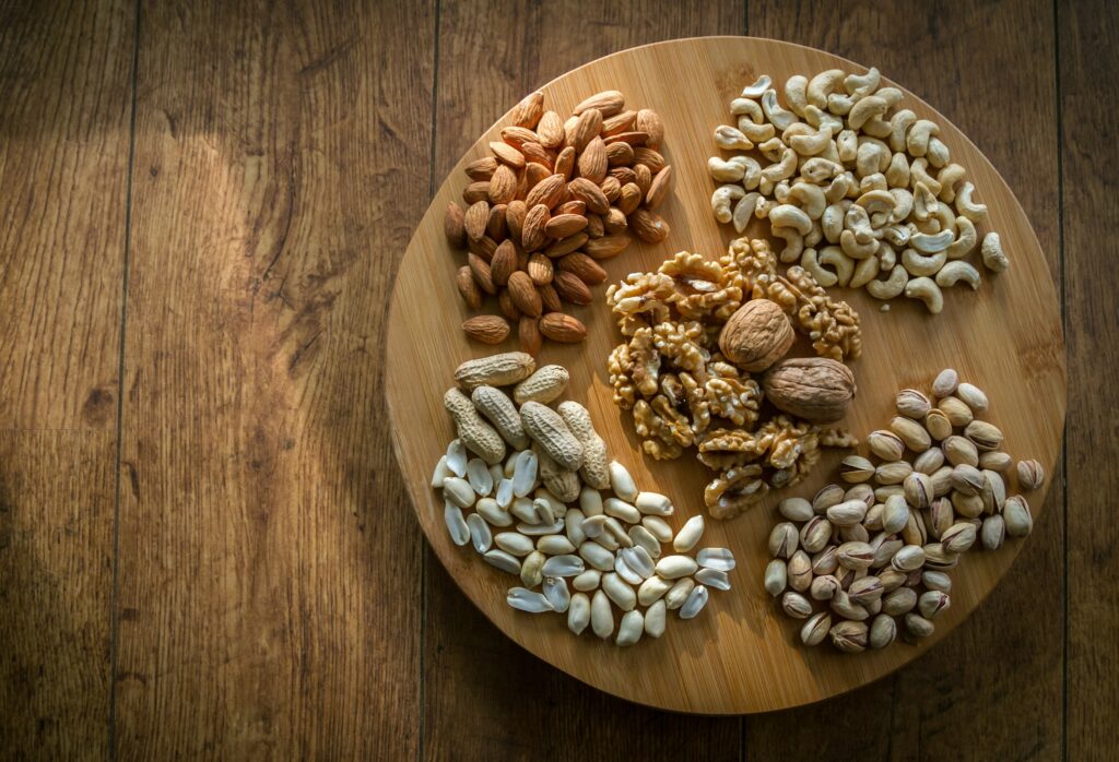 Wooden Serving Board of Various Nuts and Seeds