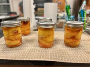 Several jars of peaches